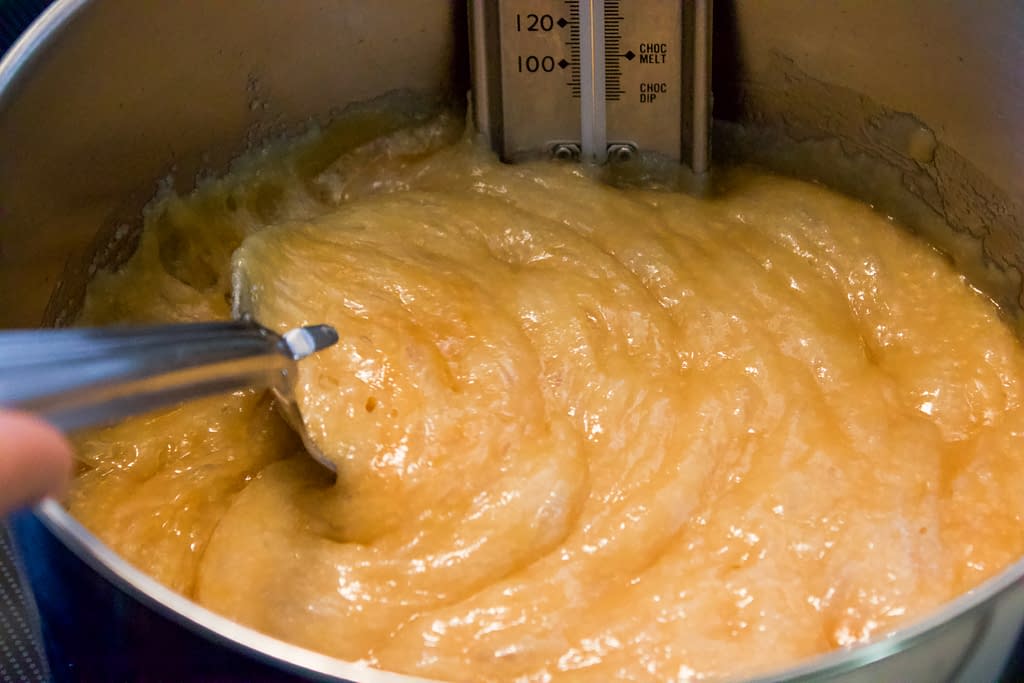 Sugar and butter syrup boiling in a pan.